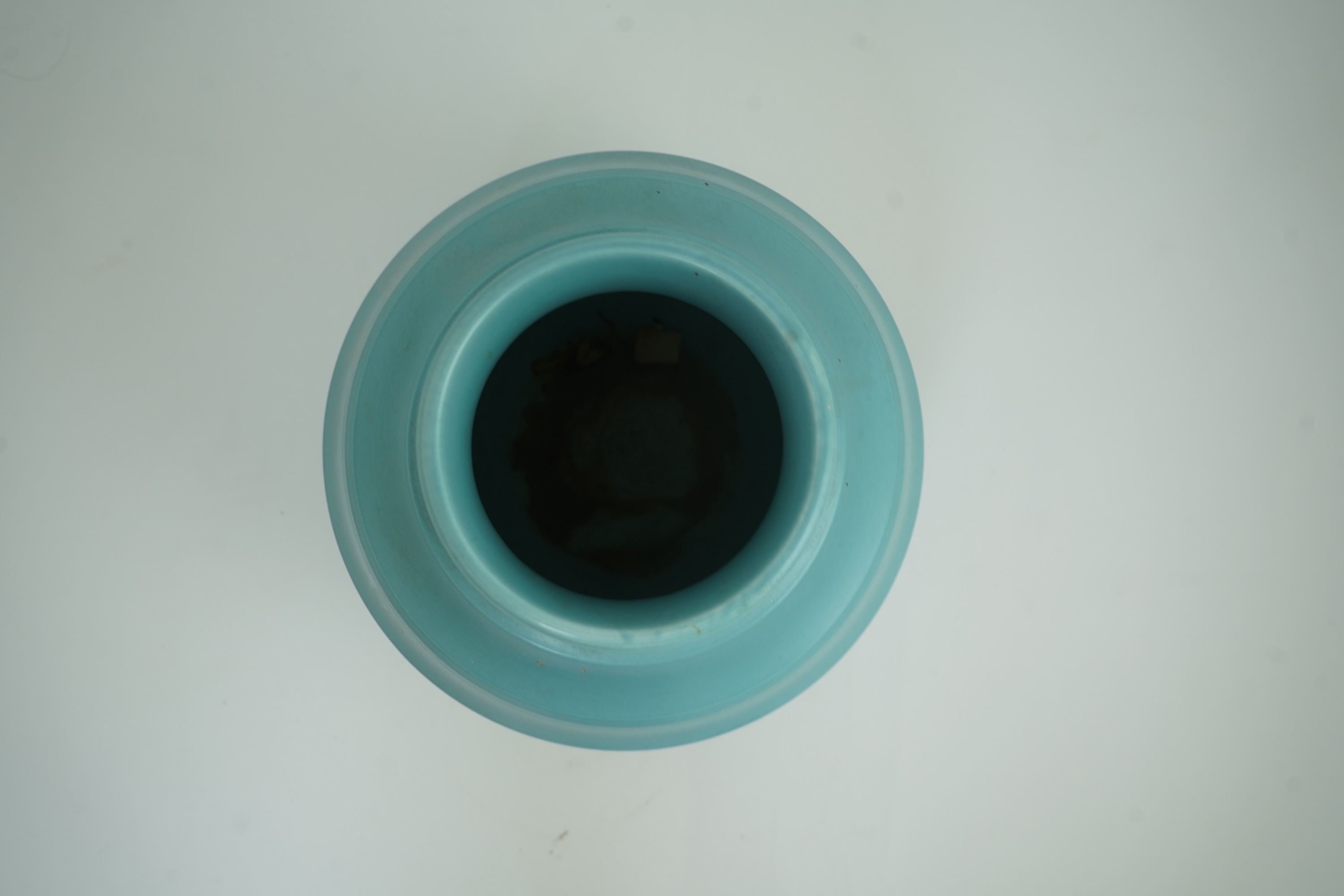 Keith Murray MC RDI FRIBA (New Zealand/British, 1892-1981) for Wedgwood: A matt blue glazed globe vase